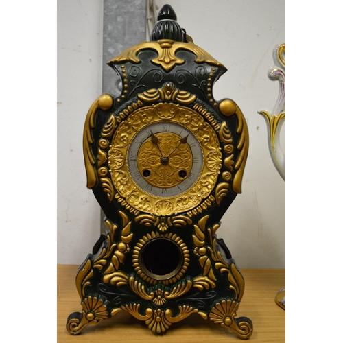 22 - A decorative mantel clock.