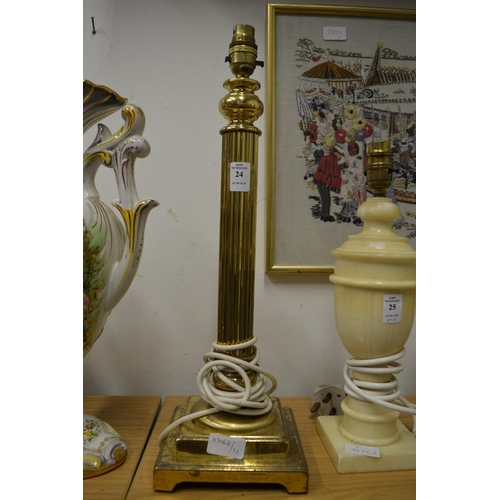 24 - A brass table lamp.