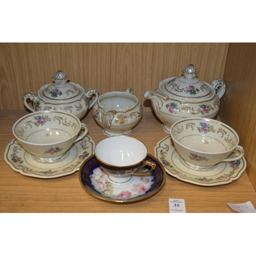 35 - Floral decorated tea for two and a porcelain cup and saucer.