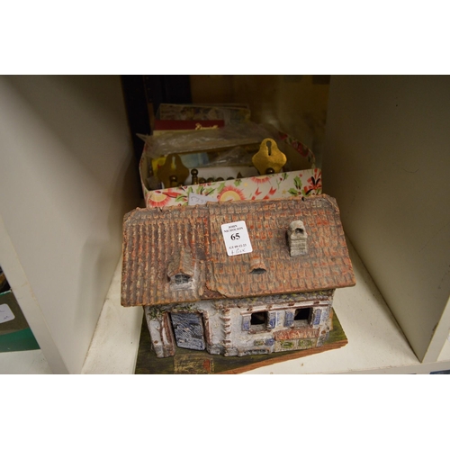 65 - An Elastolin railway cottage and other items.