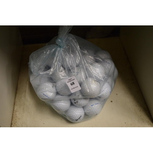 68 - A bag of Srixon golf balls.