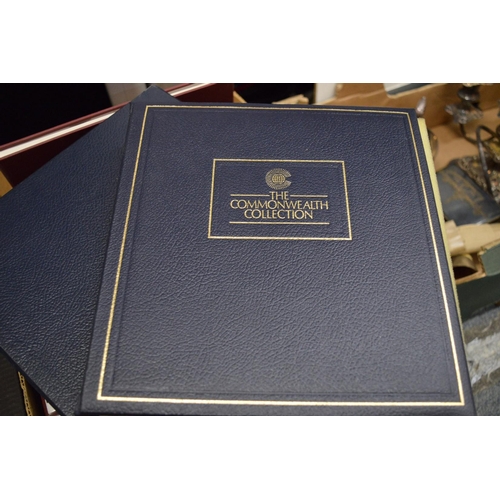 967 - A collection of stamp albums, contents plus loose stamps together with presentation coins and a 1981... 