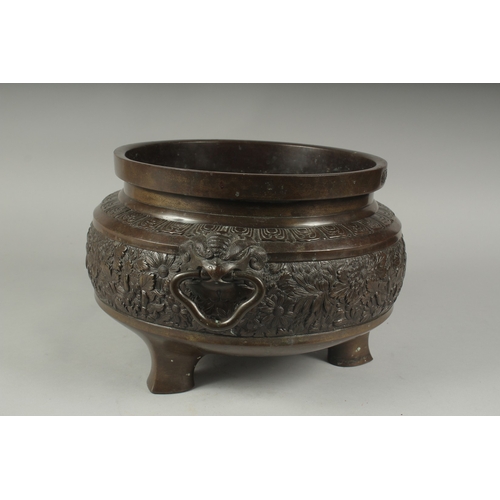 100 - A FINE LARGE BRONZE TWIN HANDLE CENSER, with relief decorated band of flowers, the handles formed an... 