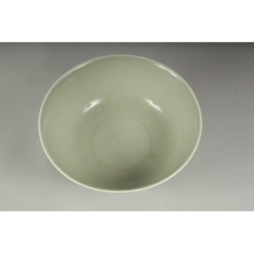 13 - A LARGE CHINESE CELADON GLAZE PORCELAIN BOWL - POSSIBLY REPUBLIC PERIOD, the exterior with a band of... 