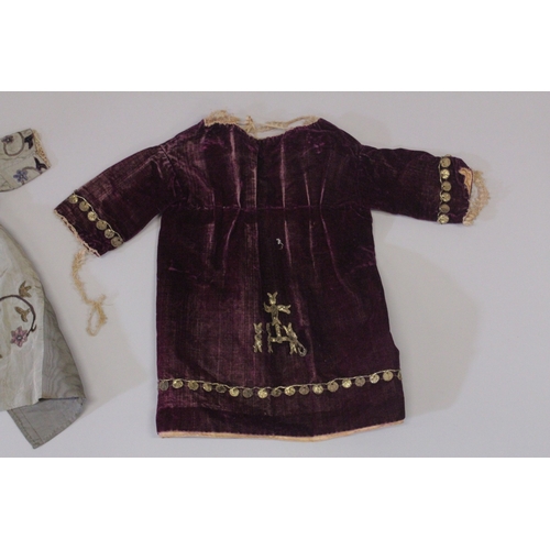 137 - A 17TH-18TH CENTURY METAL THREADED CHILD'S CEREMONIAL ROBE.