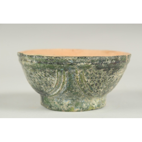 169 - A RARE 8TH - 9TH CENTURY UMAYYAD GREEN GLAZED POTTERY BOWL, 12.5cm diameter.