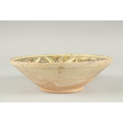 171 - A FINE 10TH - 11TH CENTURY PERSIAN NISHAPUR POTTERY BOWL depicting two birds, 21.5cm.