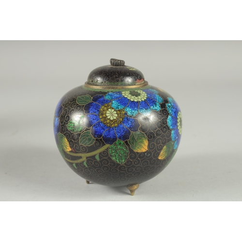 2 - A BLACK GROUND CLOISONNE JAR AND COVER, with glittered enamel flowers, 11cm high.