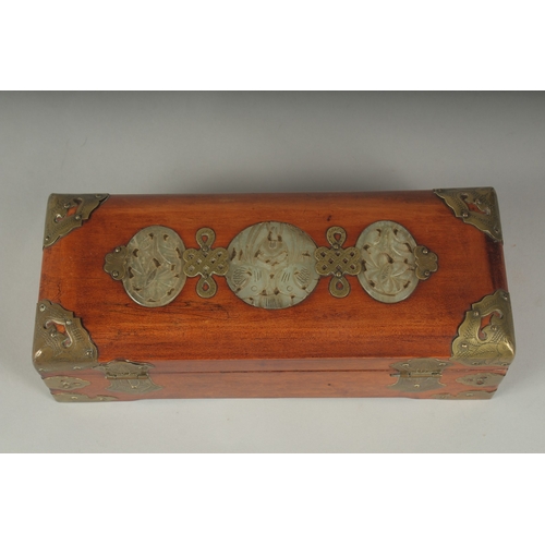 21 - A LATE 19TH - EARLY 20TH CENTURY CHINESE JADE MOUNTED HARDWOOD BOX, the hinged lid inset with three ... 