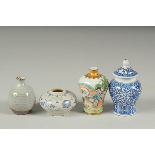 24 - FOUR CHINESE MINIATURE POTTERY PIECES, including a small Hoi An Hoard shipwreck cargo pot, a famille... 