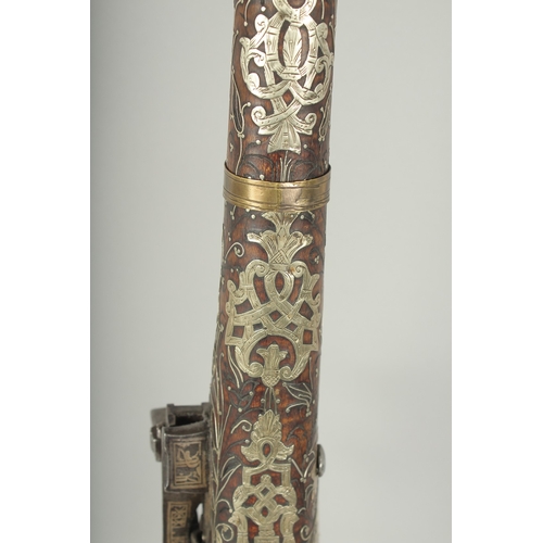 261 - A VERY FINE OTTOMAN TURKISH SILVER, BRASS, AND BONE INLAID FLINTLOCK RIFLE, with watered steel barre... 