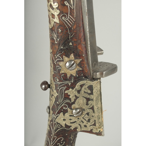 261 - A VERY FINE OTTOMAN TURKISH SILVER, BRASS, AND BONE INLAID FLINTLOCK RIFLE, with watered steel barre... 