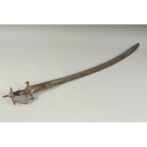 262 - A FINE 18TH CENTURY SOUTH INDIAN TULWAR SWORD, the blade with engraved Hindu deities, 93cm overall.