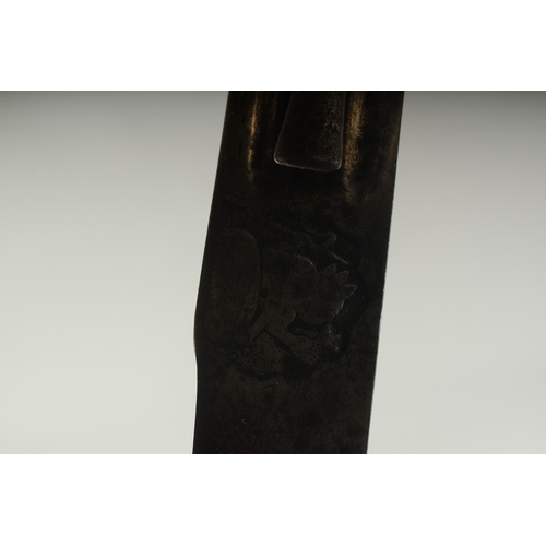 262 - A FINE 18TH CENTURY SOUTH INDIAN TULWAR SWORD, the blade with engraved Hindu deities, 93cm overall.