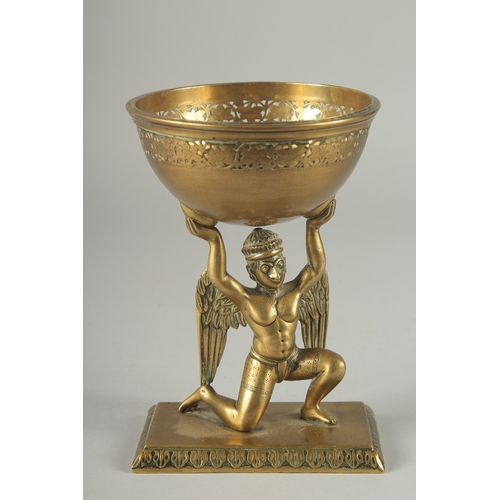 268 - A FINE 19TH CENTURY INDIAN BRASS OFFERING BOWL WITH A GARUDA BASE, 17.5cm high.