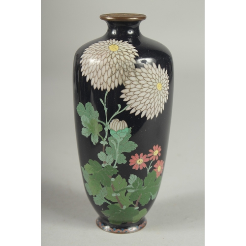 4 - A JAPANESE CLOISONNE VASE, decorated with flora, (lacking base), 15cm high.