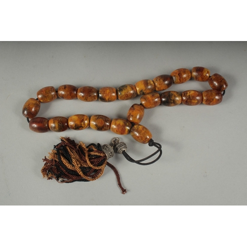 44 - A STRING OF PRAYER BEADS.