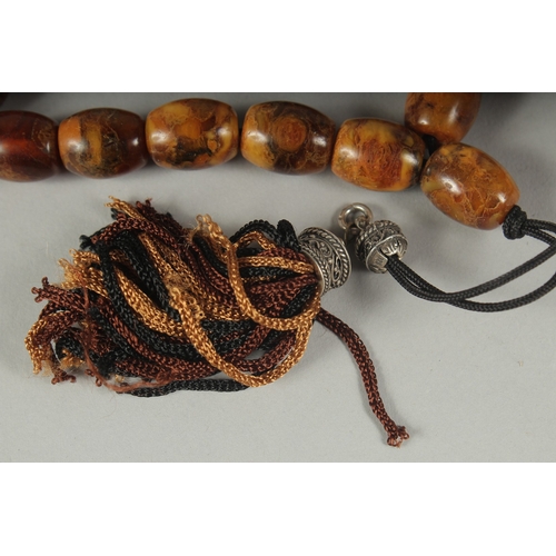 44 - A STRING OF PRAYER BEADS.