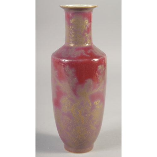 46 - A CHINESE RED GLAZE PORCELAIN VASE, with gilt decoration, the base with six-character mark, 22.5cm h... 