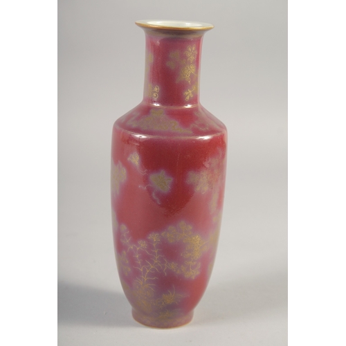 46 - A CHINESE RED GLAZE PORCELAIN VASE, with gilt decoration, the base with six-character mark, 22.5cm h... 