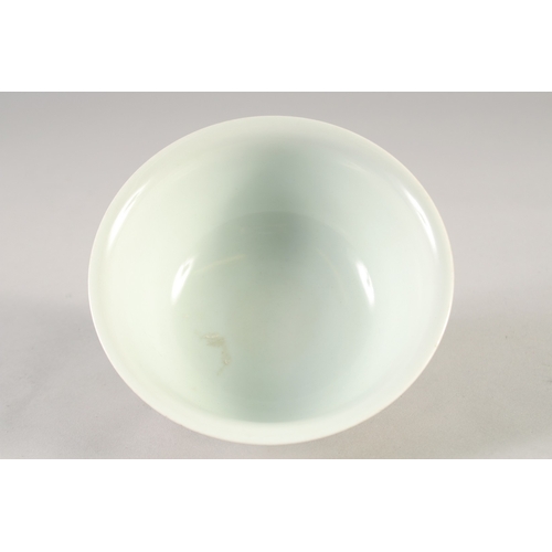 50 - A CHINESE YELLOW GLAZE PORCELAIN DRAGON BOWL, six-character mark to base, 14.5cm diameter.