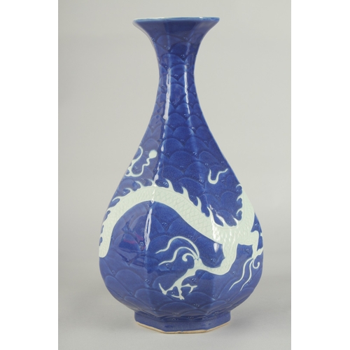 53 - A CHINESE SACRIFICIAL BLUE AND WHITE PORCELAIN DRAGON YUHUCHUNPIN VASE, with carved scale pattern, 3... 