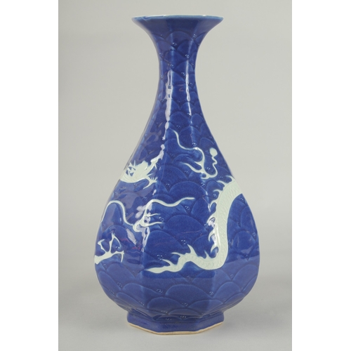 53 - A CHINESE SACRIFICIAL BLUE AND WHITE PORCELAIN DRAGON YUHUCHUNPIN VASE, with carved scale pattern, 3... 