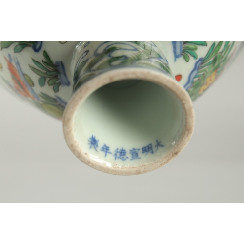 56 - A CHINESE WUCAI PORCELAIN STEM CUP, painted with ducks and aquatic flora, bowl 17cm diameter.