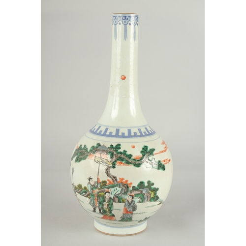 61 - A CHINESE FAMILLE VERTE PORCELAIN BOTTLE VASE, painted with a scene of various figures, 32cm high.