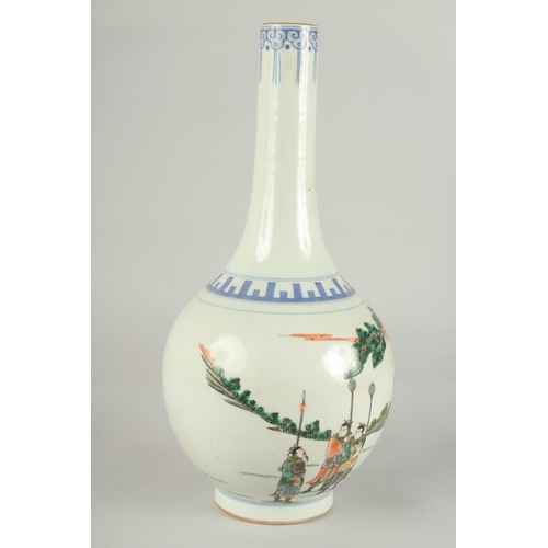 61 - A CHINESE FAMILLE VERTE PORCELAIN BOTTLE VASE, painted with a scene of various figures, 32cm high.