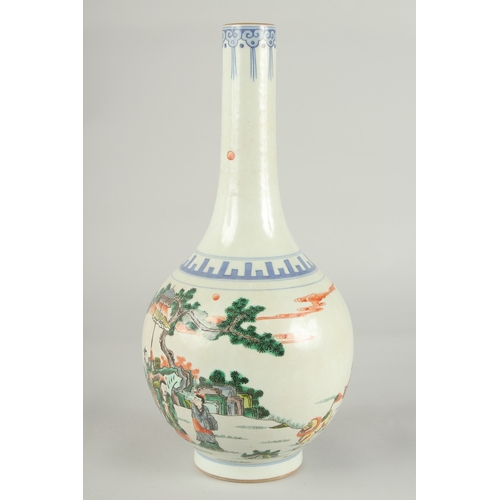 61 - A CHINESE FAMILLE VERTE PORCELAIN BOTTLE VASE, painted with a scene of various figures, 32cm high.