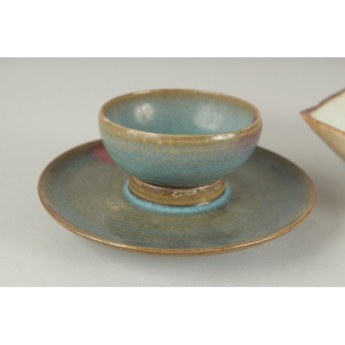 62 - A CHINESE WUCAI PORCELAIN DISH AND A JUN WARE CUP AND SAUCER, (3 pieces).