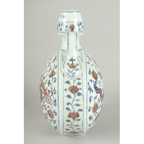 65 - A CHINESE BLUE AND UNDERGLAZE RED PORCELAIN DRAGON MOON FLASK, 30cm high.