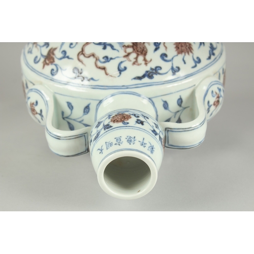 65 - A CHINESE BLUE AND UNDERGLAZE RED PORCELAIN DRAGON MOON FLASK, 30cm high.