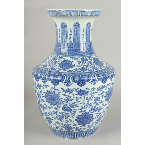 70 - A LARGE CHINESE BLUE AND WHITE PORCELAIN LOTUS VASE, 34cm high.