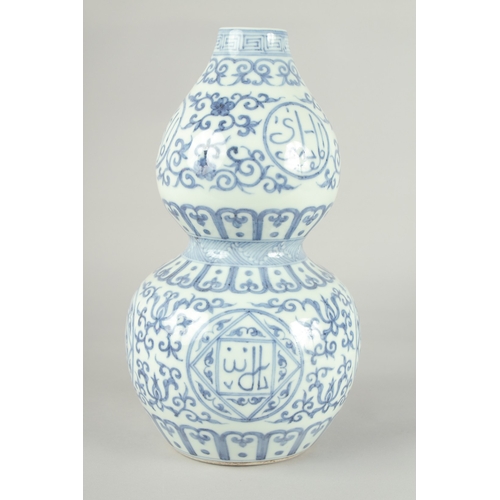 72 - A CHINESE BLUE AND WHITE PORCELAIN DOUBLE GOURD VASE, 32cm high.