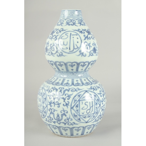 72 - A CHINESE BLUE AND WHITE PORCELAIN DOUBLE GOURD VASE, 32cm high.