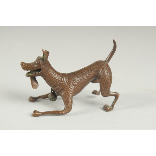 77 - A JAPANESE BRONZE OKIMONO OF A DOG, with hanging bell on the collar, mark to underside, 6.5cm long.