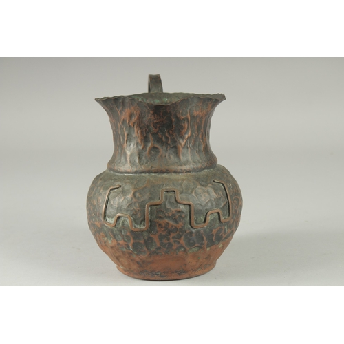 8 - AN UNUSUAL CHINESE COPPER JUG, 18.5cm high.