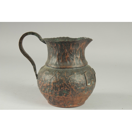 8 - AN UNUSUAL CHINESE COPPER JUG, 18.5cm high.