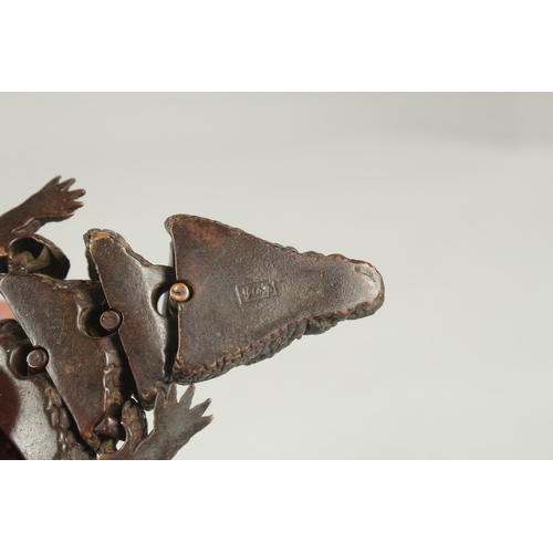 81 - A JAPANESE BRONZE RETICULATED OKIMONO OF A CROCODILE, with mark to underside of head, 21cm long.