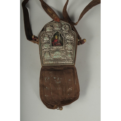 90 - A LARGE TIBETAN BUDDHISTIC SHRINE GAU PRAYER BOX, encased in hanging pouch for wearing, box embossed... 