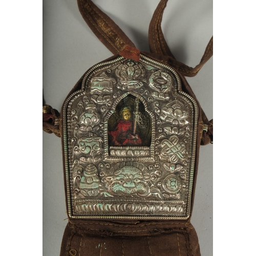 90 - A LARGE TIBETAN BUDDHISTIC SHRINE GAU PRAYER BOX, encased in hanging pouch for wearing, box embossed... 