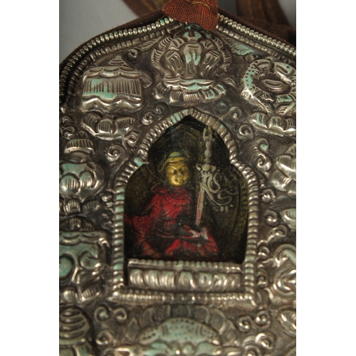 90 - A LARGE TIBETAN BUDDHISTIC SHRINE GAU PRAYER BOX, encased in hanging pouch for wearing, box embossed... 