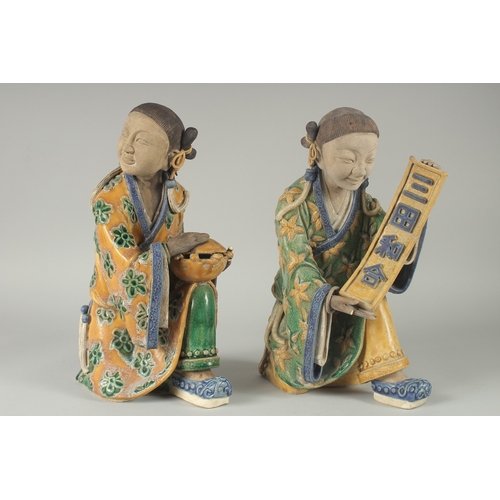 92 - A LARGE PAIR OF 19TH CENTURY CHINESE SANCAI GLAZED POTTERY FIGURES, 33cm high.