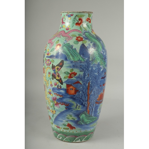 94 - A LARGE CHINESE BLUE AND WHITE PORCELAIN VASE WITH LATER FAMILLE ROSE DECORATION, the blue and white... 