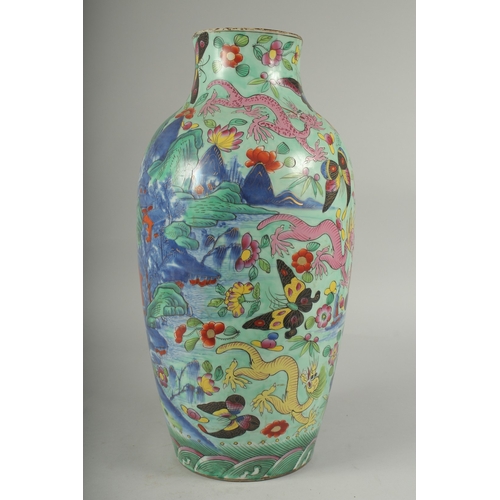 94 - A LARGE CHINESE BLUE AND WHITE PORCELAIN VASE WITH LATER FAMILLE ROSE DECORATION, the blue and white... 