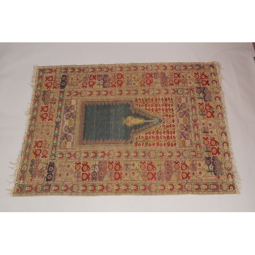 1001 - A PERSIAN PRAYER RUG, beige ground with stylised borders. 5ft 10ins x 4ft 4ins.