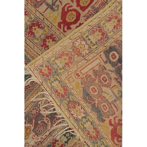 1001 - A PERSIAN PRAYER RUG, beige ground with stylised borders. 5ft 10ins x 4ft 4ins.