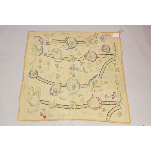 1005 - A FRENCH EMBROIDERED BEDSPREAD with birds amongst trees, silk trimmed border. 4ft 7ins x 4ft 7ins.... 